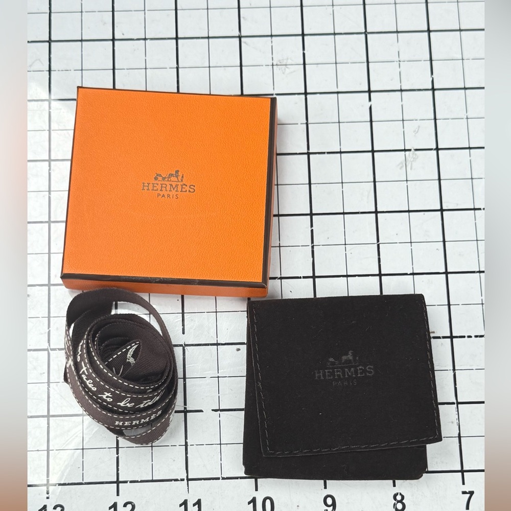 Hermes Orange and Black Storage Box. 3 by 3 inches, ribbon, brown pouch. - Picture 4 of 7